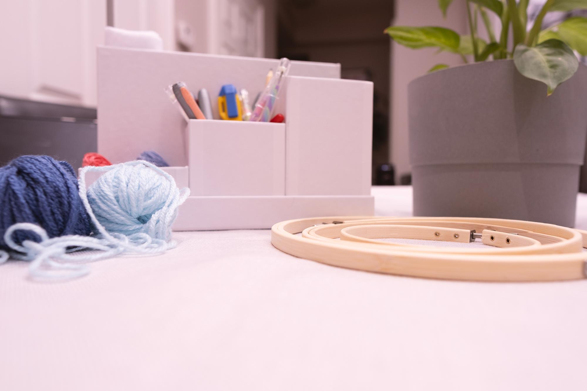 Studio table with threads and hoops