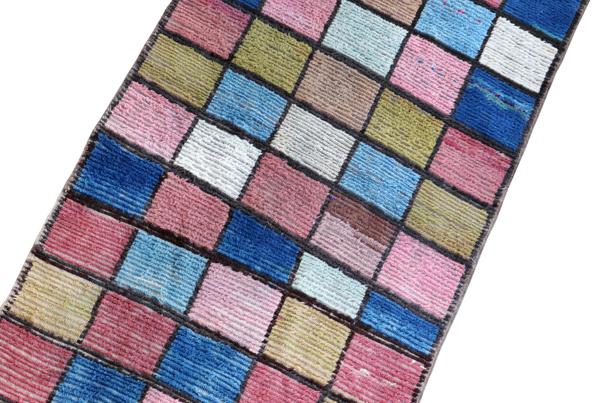Close-up of colorful embroidered patch on linen
